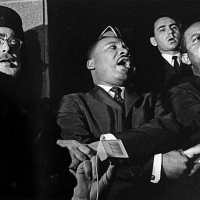 Martin Luther King Singing In Brown Chapel, Selma Alabama / Photo by John Kouns 1965