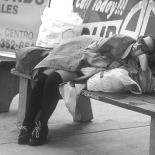 \"Sleeping on a bus stop\" Los Angeles