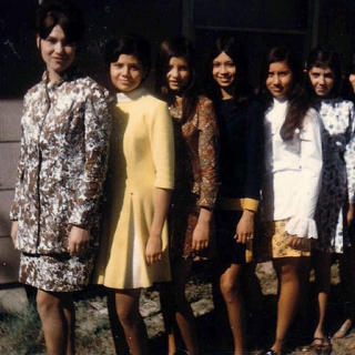 With cousins in Texas 1967. Yolanda in front, Annie in back, wearing matching outfits made by Yolanda.